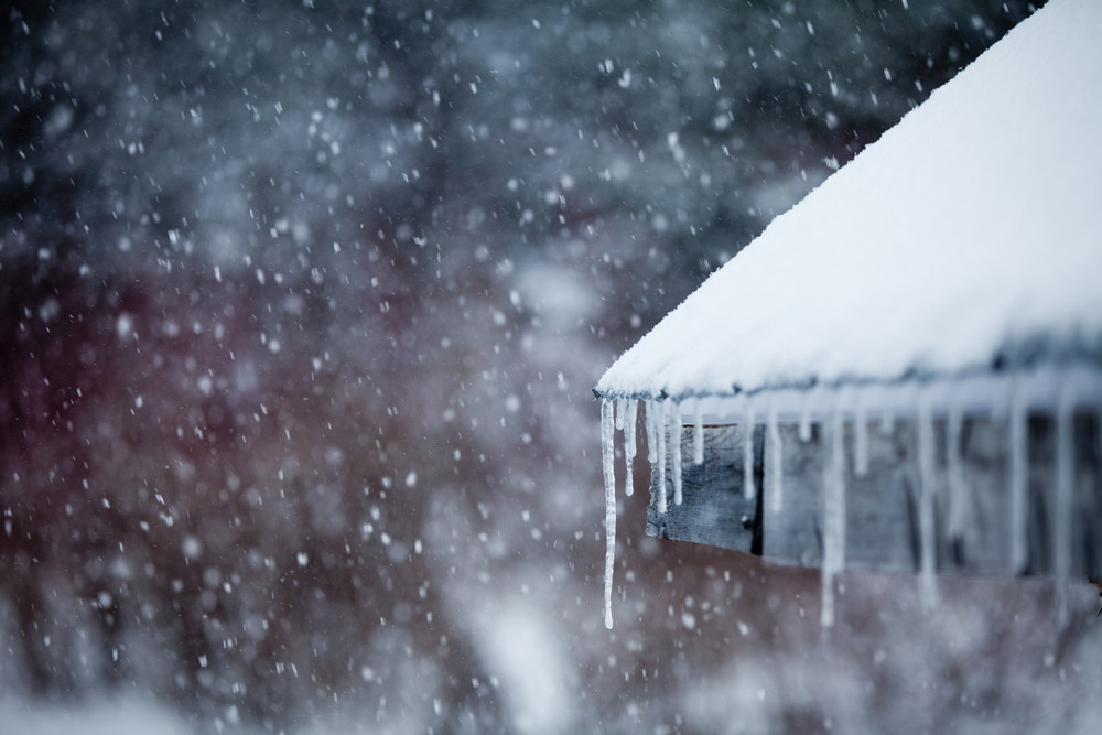 Icicles hanging from roof.